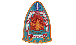 The logo for Palmerdale Fire and Rescue, established 1972.